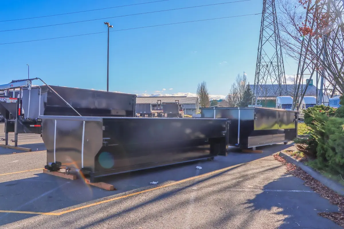 Roll-off dumpster ready for waste disposal at job site for 2 Yard Dumpster Rental in Topsfield